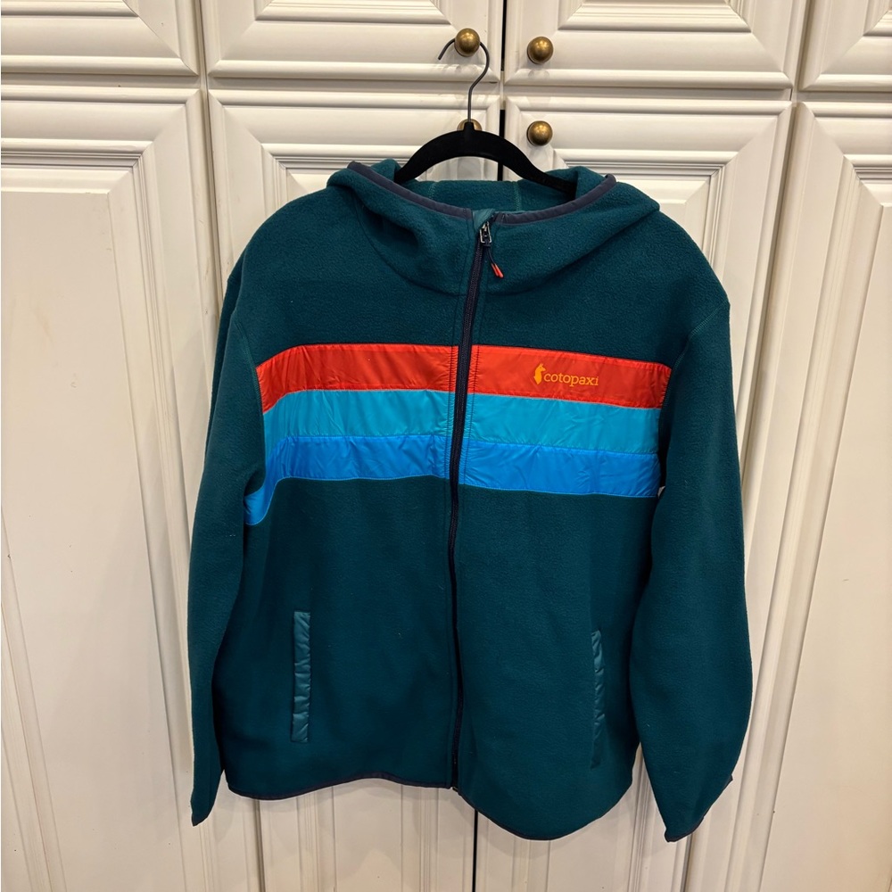 cotopaxi Teal Jacket with Red and Blue Stripes